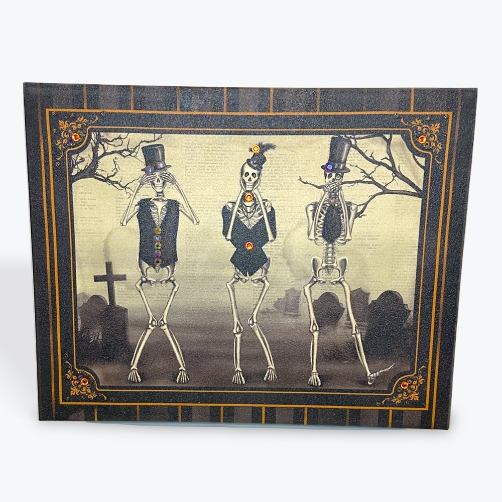 The See No, Hear No, Speak No Canvas Art Print featuring a skeletal trio